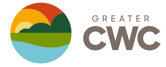 A circular logo with a sun setting behind green hills above a blue river, next to the text "GREATER CWC" in bold, gray letters—representing community services like DNA testing in Cayce SC.